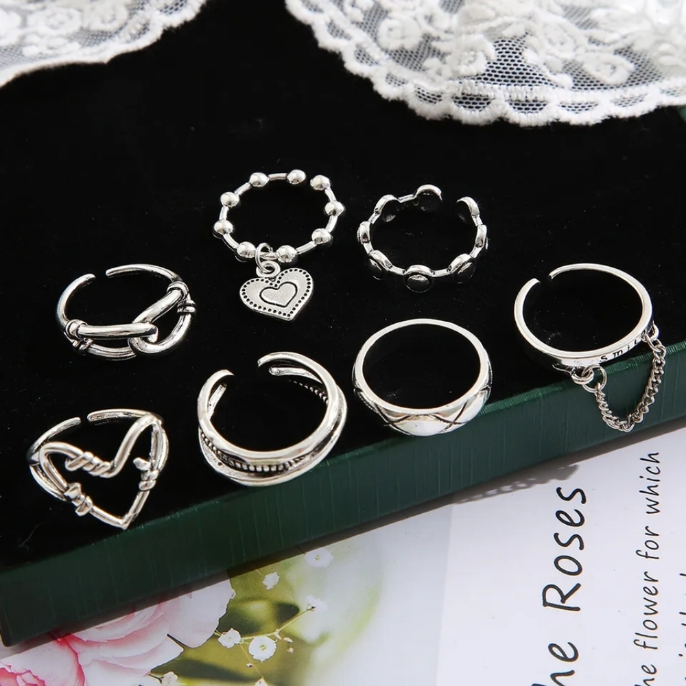 New sealed lot of 7 silver rings, variety of sizes